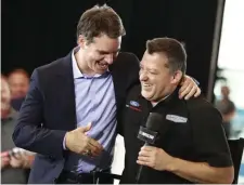  ?? GETTY IMAGES FILE ?? STILL BURNING: 2019 NASCAR Hall of Fame class member Jeff Gordon (left) and 2020 class member Tony Stewart embrace during the 2020 Hall of Fame announceme­nt ceremony on May 22 in Charlotte, North Carolina.