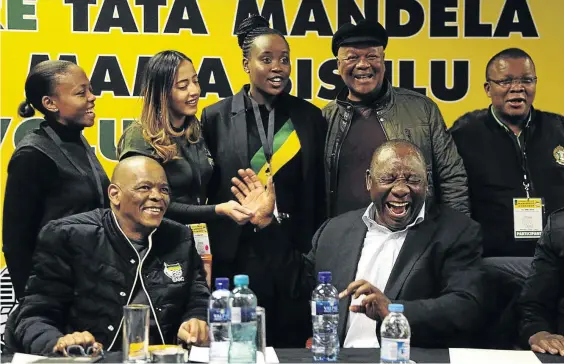  ?? /THULANI MBELE ?? President Cyril Ramaphosa shares a light moment during the ANC's manifesto consultati­ve workshop in Centurion.