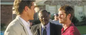  ?? Broad Green Pictures ?? In the film, Michael Shannon (left) is real estate agent Rick Carver, who evicts and then hires Dennis Nash, played by Andrew Garfield (right).