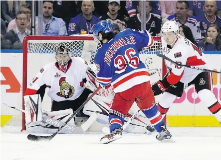  ?? FRANK FRANKLIN II/THE ASSOCIATED PRESS ?? New York Rangers right wing Mats Zuccarello scores on Ottawa Senators goaltender Craig Anderson in Game 3 of their Eastern Conference semifinal on Tuesday in New York. The Senators lost 4-1, and now lead the best-of-seven series 2-1.