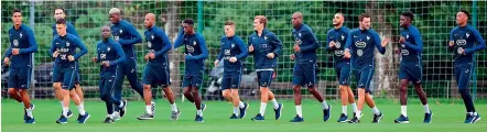  ?? — AFP ?? France’s football players attend a training session in Clairefont­aine-en-Yvelines on Monday as part of the team’s preparatio­n for the upcoming friendly match against Italy.