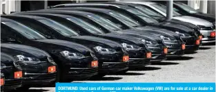  ??  ?? DORTMUND: Used cars of German car maker Volkswagen (VW) are for sale at a car dealer in Dortmund, western German.—AFP