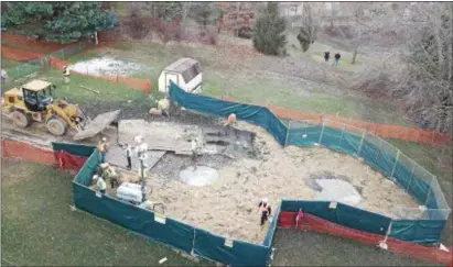  ?? SUBMITTED PHOTO ?? File photo shows sinkhole believed tied to pipeline constructi­on behind home on Lisa Drive in West Whiteland Township. The state Public Utility Commission yesterday halted constructi­on on the Mariner East 2 and shut down Mariner East 1 after new safety...