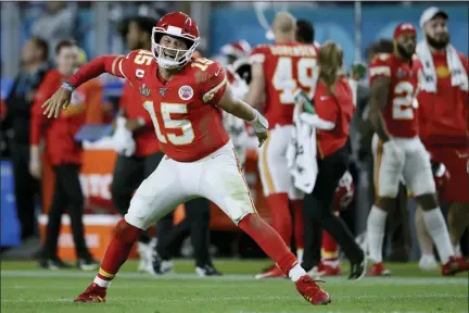  ?? JOHN BAZEMORE — THE ASSOCIATED PRESS FILE ?? In this Feb. 2, 2020, photo, Kansas City Chiefs’ quarterbac­k Patrick Mahomes celebrates his touchdown pass to Damien Williams in the the second half of the NFL Super Bowl 54 football game in Miami Gardens, Fla.