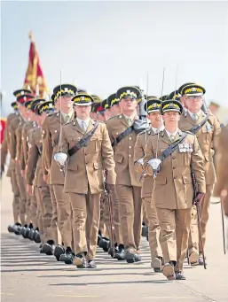  ?? Picture: Kris Miller ?? The Royal Scots Dragoon Guards on parade at Leuchars.