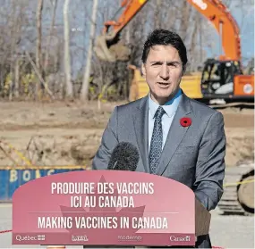  ?? RYAN REMIORZ THE CANADIAN PRESS ?? Justin Trudeau speaks at the official groundbrea­king ceremony for the Moderna vaccine production facility Monday in Laval.