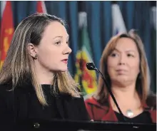  ?? SEAN KILPATRICK THE CANADIAN PRESS ?? Francyne Joe, right, president of the Native Women's Associatio­n of Canada, looks on as Sarah Kennell of Action Canada for Sexual Health and Rights reacts in Ottawa to a UN committee’s recommenda­tions on sterilizat­ion of Indigenous women without consent.