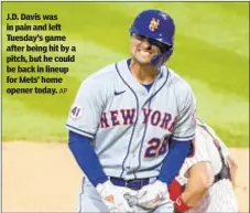  ?? AP ?? J.D. Davis was in pain and left Tuesday’s game after being hit by a pitch, but he could be back in lineup for Mets’ home opener today.