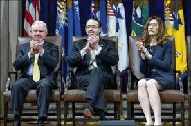  ?? JOSE LUIS MAGANA / AP ?? Attorney General Jeff Sessions, Deputy Attorney General Rod Rosenstein and Associate Attorney General Rachel Brand, at the Department of Justice, Friday. A memo released Friday alleges the DOJ abused its powers by obtaining a surveillan­ce warrant using...