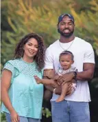  ?? PHOTO PROVIDED BY TYVIS POWELL ?? Tyvis Powell with his wife, Laurencia, and daughter, Leiliana.
