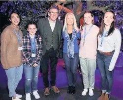  ??  ?? Aha! Cara Tavendale (second from right) and her sister Shoni (right) with actor Steve Coogan and others who attended the event