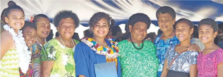  ??  ?? Mere Rasavere (fifth from the left) with her proud aunts, grandmothe­r and other family members at the Fiji National University graduation at the Vodafone Arena in Suva yesterday.