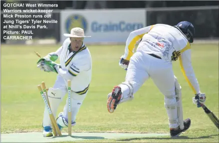  ??  ?? GOTCHA! West Wimmera Warriors wicket-keeper Mick Preston runs out Jung Tigers’ Tyler Neville at Nhill’s Davis Park. Picture: PAUL CARRACHER