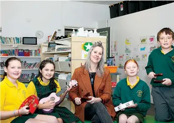  ?? ?? Enjoying music class are students from left: Chloe Maynard, Scarlett Murto, (teacher) Liza Marino, Liana Eerhard and Kaylem Horton.