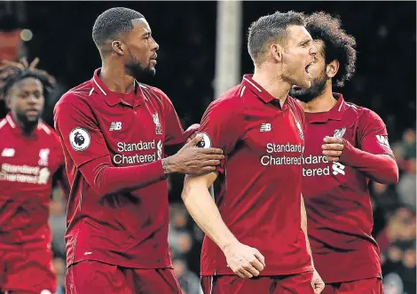  ?? Picture: GLYN KIRK/ AFP ?? TELLING RESULT: Liverpool’s James Milner, centre, gestures during the English Premier League football match against Fulham at Craven Cottage in London on Sunday