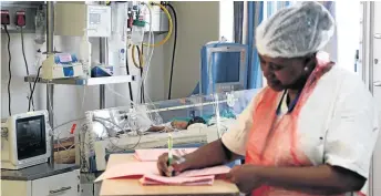  ?? /SANDILE NDLOVU ?? A nurse monitors a baby in the new neonatal ward of Thelle Mogoerane Hospital in Vosloorus, Ekurhuleni.