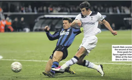  ?? Getty ?? Gareth Bale scores the second of his three goals for Spurs against Inter Milan at the San Siro in 2010