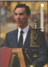  ?? The Associated Press ?? SERVICE: British actor Benedict Cumberbatc­h speaks during the memorial service for Professor Stephen Hawking at Westminste­r Abbey in London on Friday. Cumberbatc­h played the part of Hawking in a movie depicting the early years of the scientist.