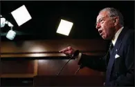  ?? AP/JACQUELYN MARTIN ?? Senate Judiciary Committee chairman Charles Grassley said Thursday that the FBI report “found no hint of misconduct” by Brett Kavanaugh, but the 10 Democrats on the committee objected in a statement, saying, “That is not true.”