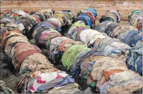  ?? Photo: Luke Dray/getty Images ?? Remains: Clothing at the Nyamata Church Genocide Memorial where 45 000 genocide victims are buried.