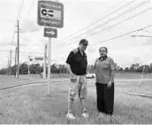  ?? RYAN GILLESPIE/STAFF ?? Keith Laytham, left, and Martin Negron, right, are among Poinciana-area residents in legal disputes developer Avatar.