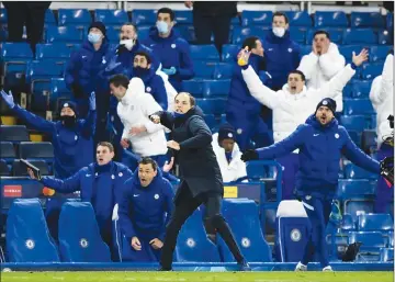  ??  ?? Chelsea manager Thomas Tuchel and the bench react at the end of the second leg match between Chelsea and Real Madrid in London on Wednesday