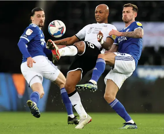  ?? Chris Fairweathe­r/huw Evans Agency ?? Andre Ayew, here in action against Cardiff last month, should be fit for the play-offs, says manager Steve Cooper.