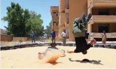  ??  ?? GHARYAN, Libya: Libyan recruits take part in military training at a center some 80 km south of the capital Tripoli on July 11, 2017. — AFP