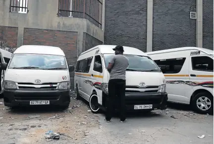  ?? /THULANI MBELE ?? Soweto taxis are grounded after Gauteng transport MEC Ismail Vadi ordered a shutdown of some the taxi ranks and routes due to violence between two associatio­ns in the area.