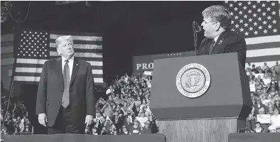  ?? CAROLYN KASTER / THE ASSOCIATED PRESS FILES ?? President Donald Trump listens to Fox News’ Sean Hannity speak during a rally last month in Cape Girardeau, Mo. If you are a progressiv­e, listening to Hannity may make your head explode, Lawrence Solomon warns.
