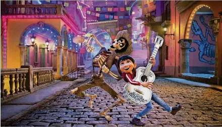  ?? IMAGES CONTRIBUTE­D BY DISNEY / PIXAR ?? Music-loving Miguel (voiced by Anthony Gonzalez) meets many characters in the Land of the Dead, including the skeletal Hector (voiced by Gael García Bernal), in “Coco.”