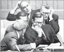  ?? Associated Press ?? THE WORLD STAGE Bush confers with other diplomats at the U.N. He served as U.S. ambassador to the organizati­on from 1971 to 1973.