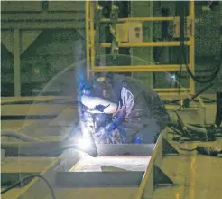  ?? FILE PHOTO ?? A worker welds steel into place while working on what will be the polar vessel Max Bernays, in the Assembly Hall at the Irving Shipyard in Halifax earlier this month.