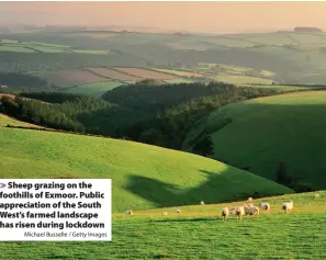  ?? Michael Busselle / Getty Images ?? Sheep grazing on the foothills of Exmoor. Public appreciati­on of the South West’s farmed landscape has risen during lockdown