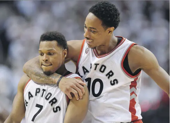  ?? FRANK GUNN/THE CANADIAN PRESS/FILES ?? Kyle Lowry, left, and DeMar DeRozan will once again be counted on to lead a Raptors franchise hoping to take the next step in the post-season.