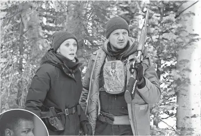  ?? FRED HAYES, THE WEINSTEIN COMPANY ?? A rookie FBI agent (Elizabeth Olsen) and a wildlife tracker (Jeremy Renner) set out in the ruthless Wyoming winter to hunt a killer in Wind River.