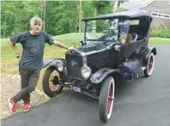  ??  ?? Tim Moore with Mike, his beloved Ford Model T