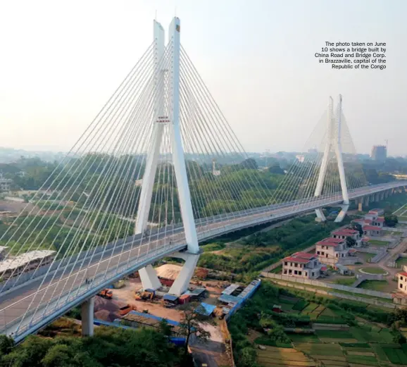  ??  ?? The photo taken on June 10 shows a bridge built by China Road and Bridge Corp. in Brazzavill­e, capital of the Republic of the Congo