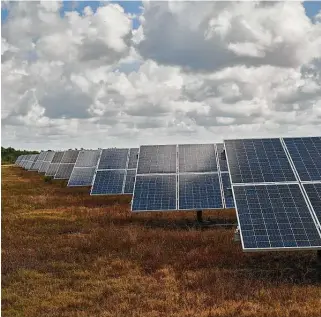  ?? Zack Wittman / New York Times ?? Brazoria County is seeing developmen­t of solar-panel farms similar to this one in Babcock Ranch, Fla. The county has one completed solar farm, but seven others are in developmen­t.