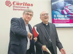  ?? MARTA PÉREZ / EFE ?? Busquets y Omella presentaro­n la campaña de Càritas