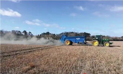  ?? Photograph: Dr Dimitar Epihov ?? Crushed basalt is applied to an arable field in Norfolk as part of the research programme of the Leverhulme Centre for Climate Change Mitigation.