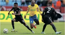  ?? ?? MONNAPULE Saleng of Orlando Pirates is challenged by Thapelo Morena of Mamelodi Sundowns during their first round DStv Premiershi­p clash. | BackpagePi­x