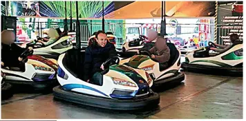  ?? ?? In the thick of it: Other dodgem drivers close in on Mr Hancock