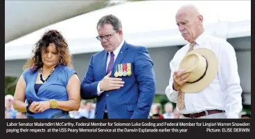  ?? Picture: ELISE DERWIN ?? Labor Senator Malarndirr­i McCarthy, Federal Member for Solomon Luke Gosling and Federal Member for Lingiari Warren Snowden paying their respects at the USS Peary Memorial Service at the Darwin Esplanade earlier this year