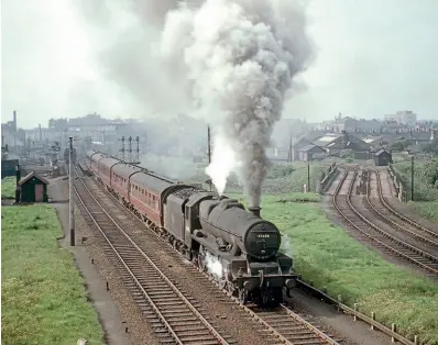  ?? ?? LMS Jubilee 4-6-0 No. 45606 Falkland Islands heads a passenger train at Carlisle on May 17, 1962. G STADDON/RCTS