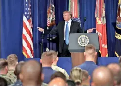  ??  ?? U.S. President Donald Trump gestures before delivering remarks on Americas military involvemen­t in Afghanista­n at the Fort Myer military base on August 21, 2017 in Arlington, Virginia. AFP