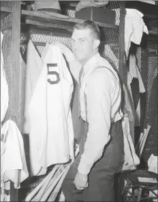  ?? AP PHOTO ?? JUST AS HE WAS ABOUT TO DON UNIFORM for another game at shortstop with the Washington Senators April 18, 1941, Cecil Travis received notice from his Fayettevil­le, Ga.,. draft board that he had been classed 1-A and could expect to be called for military service in about a month. Travis decided he would not appeal.