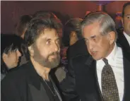  ?? Jeff Kravitz / Associated Press 2003 ?? “Scarface” lead actor Al Pacino listens to the film’s producer Martin Bregman (right) in 2003.