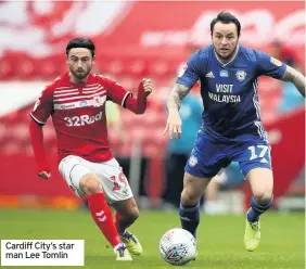  ??  ?? Cardiff City’s star man Lee Tomlin