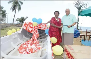  ?? Photo: Manhar Lal ?? Prime Minister Voreqe Bainimaram­a handing over a new fibreglass boat at the Nosonoso Melanesian Settlement in Ovalau during his visit on July 31, 2018.